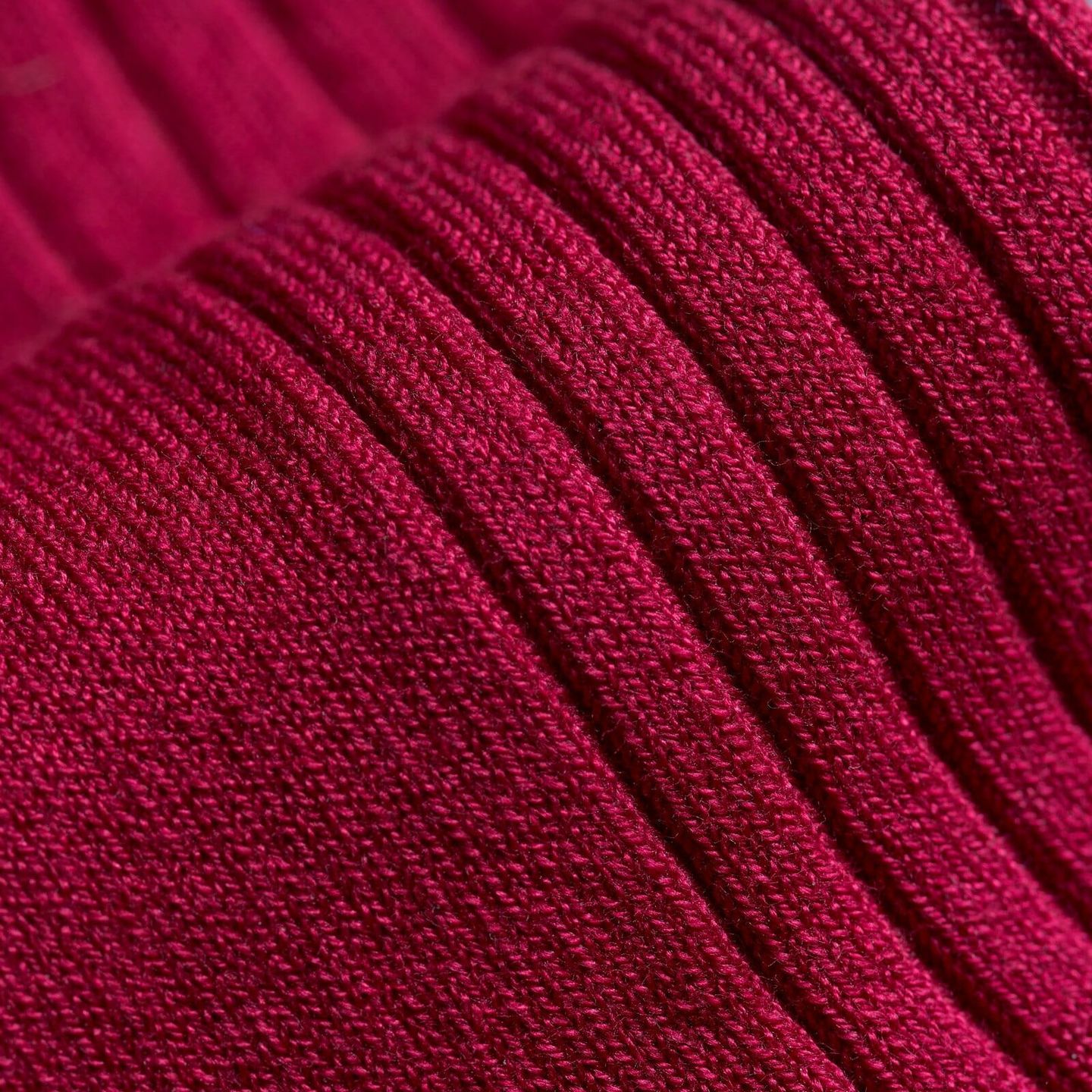 Close up of a sartorial ruby red mens sock