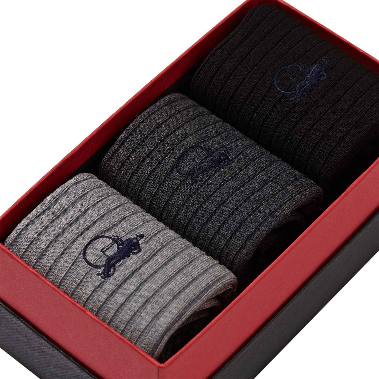Close up of a greyscale trio pack of socks in a presentation box