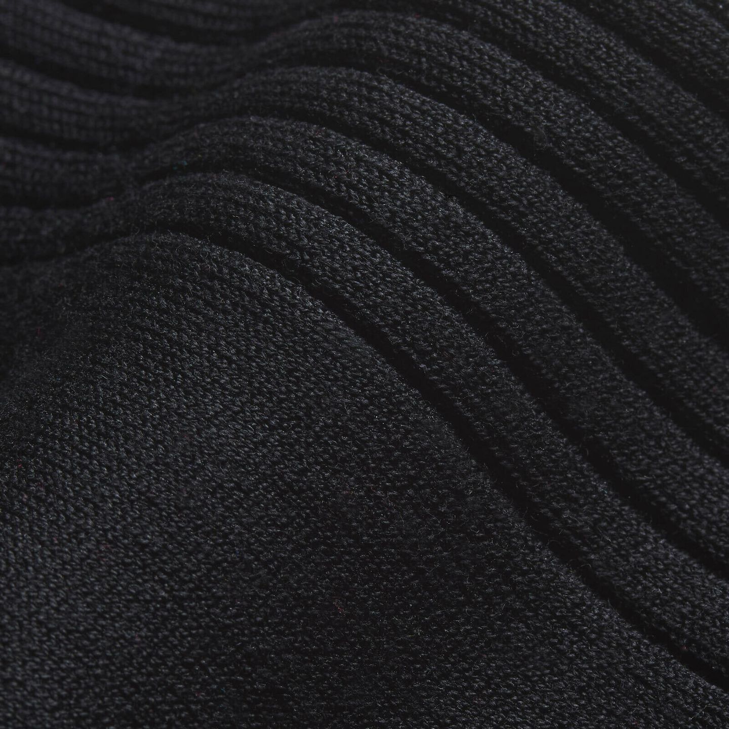 A close up of a black sock