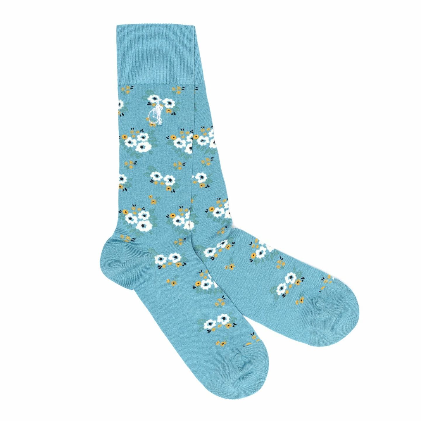 A pair of light blue socks with a flower design on them