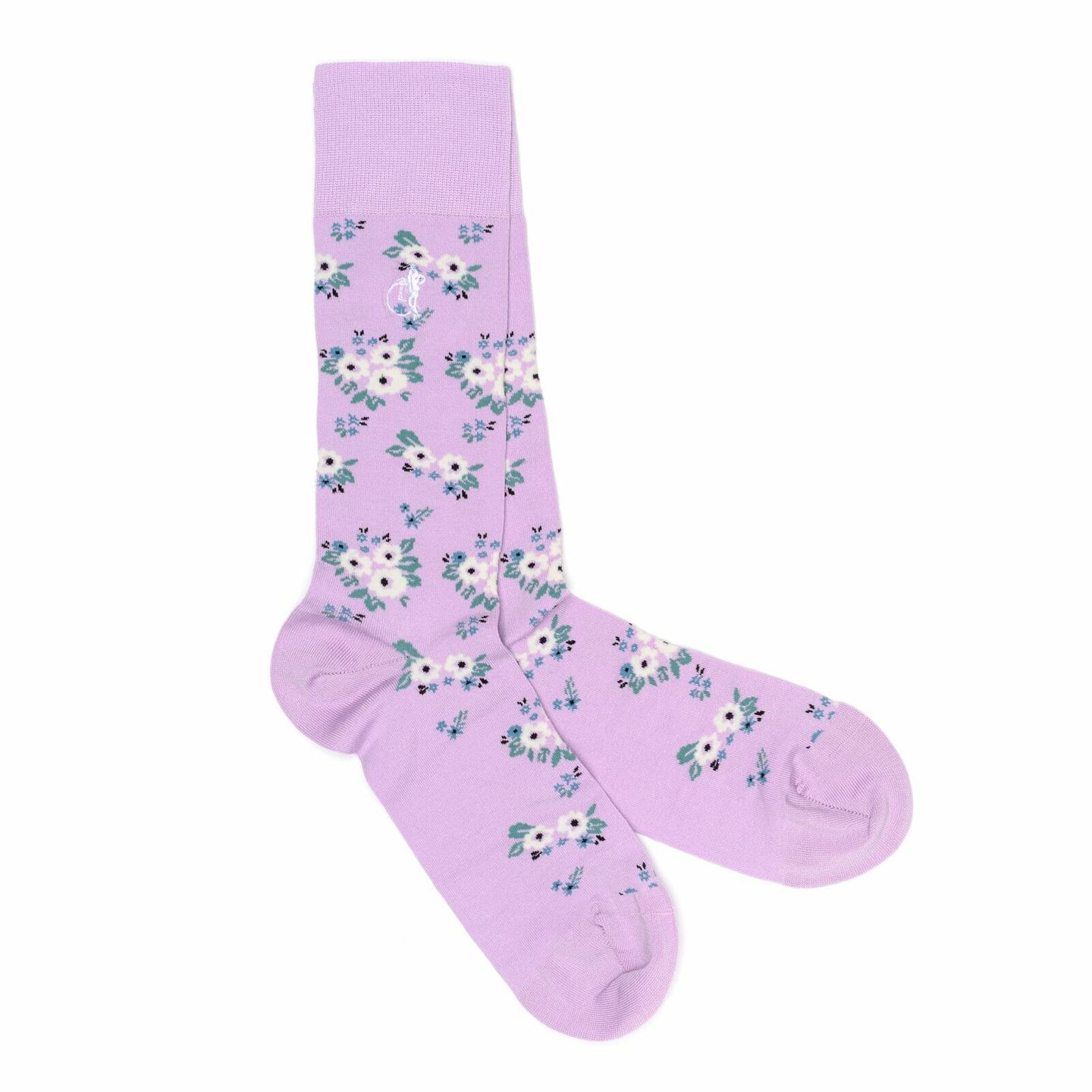 A pair of pink socks with flowers on them