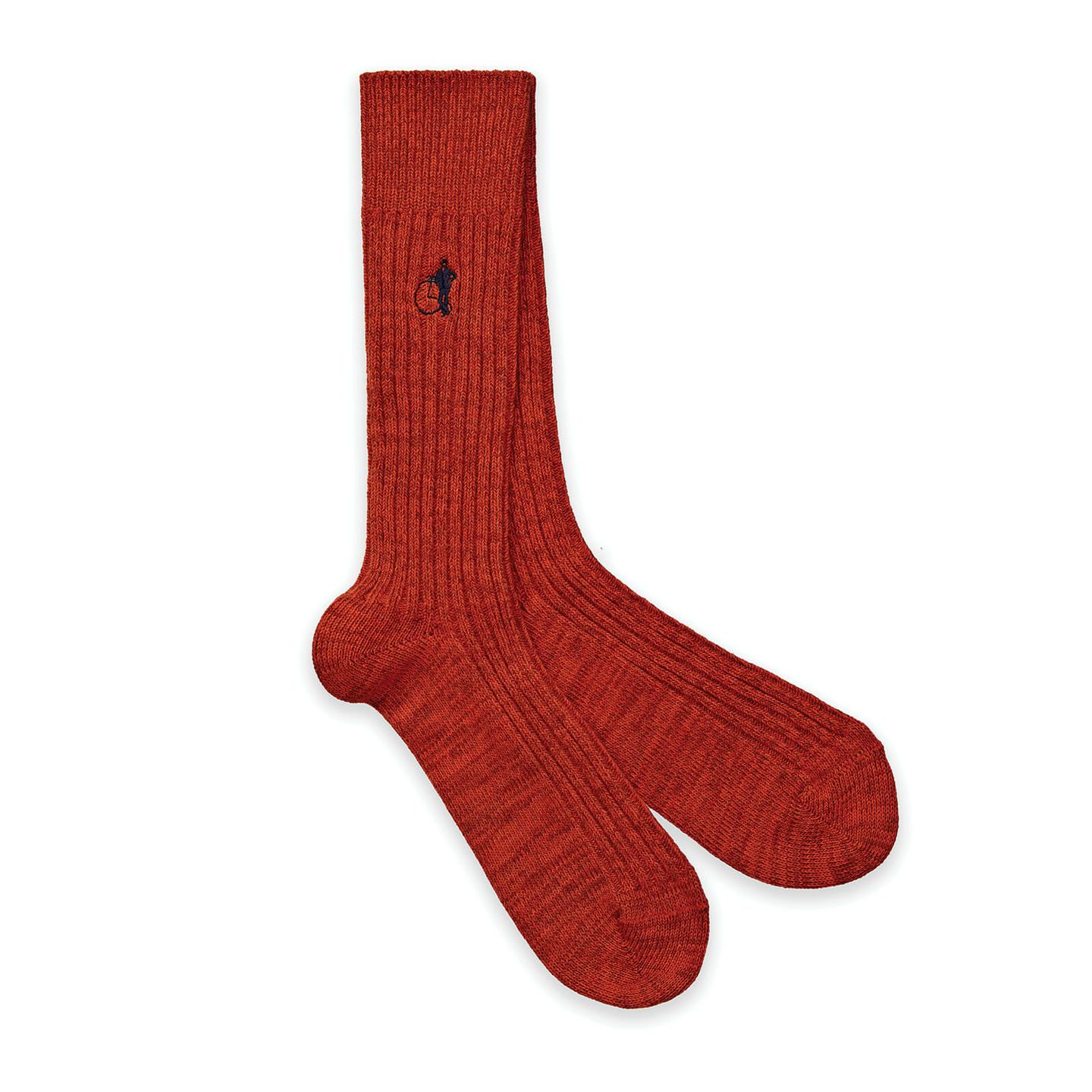 A pair of orange socks with a white background
