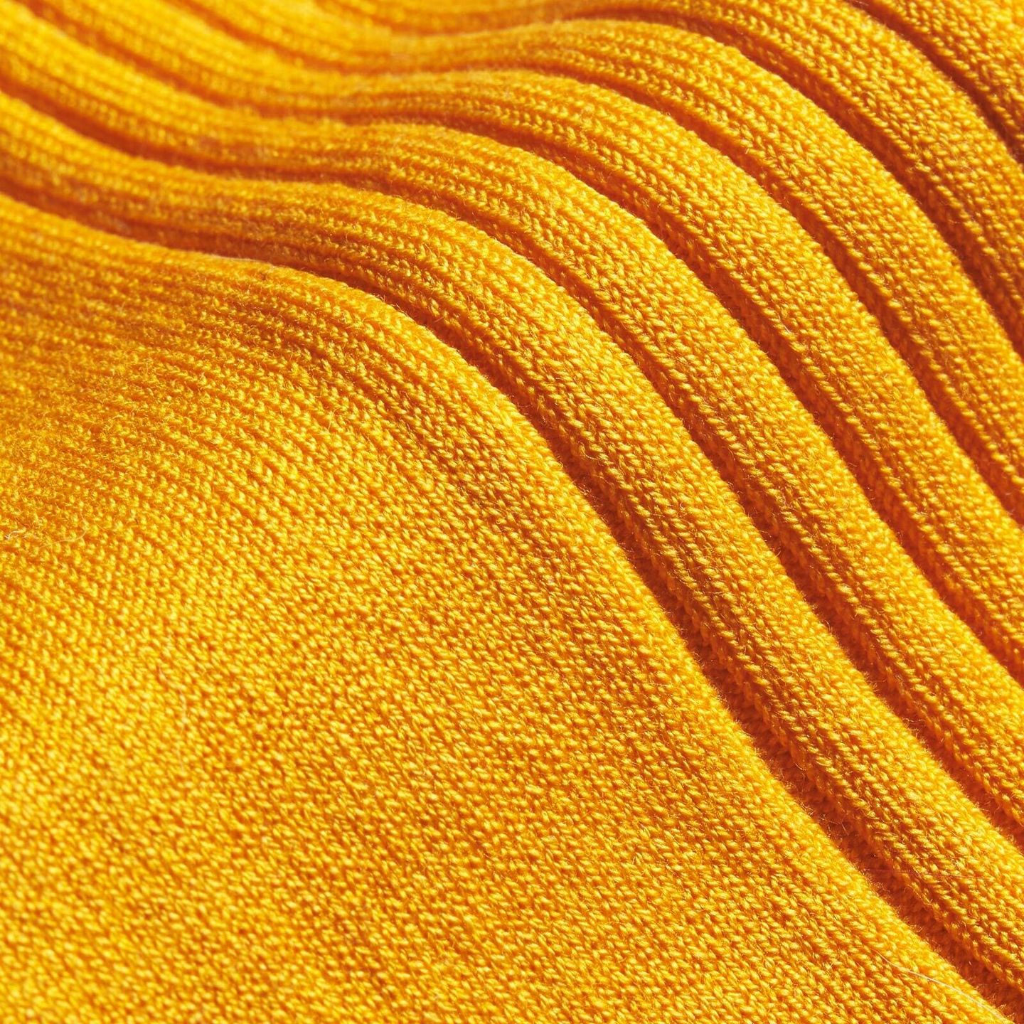 A close up of an orange sock