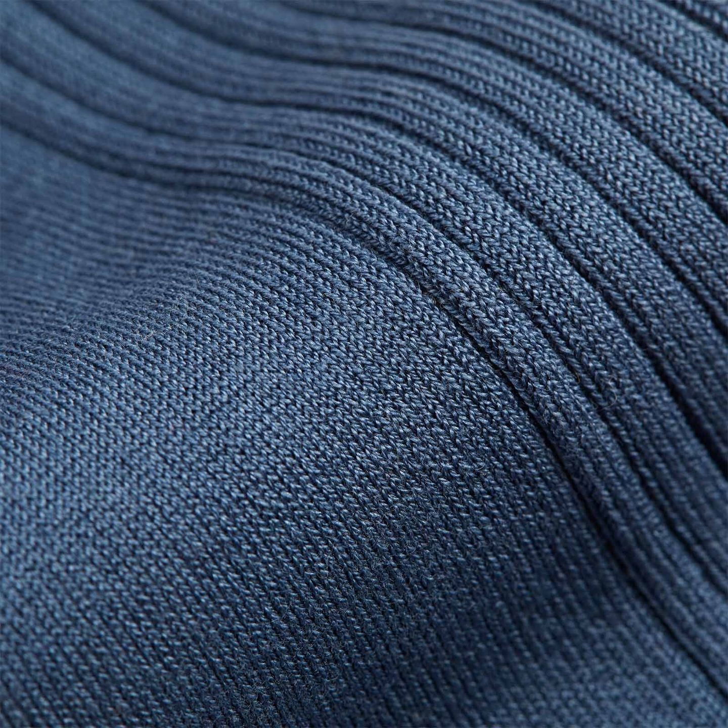A close up of a dark blue socks material