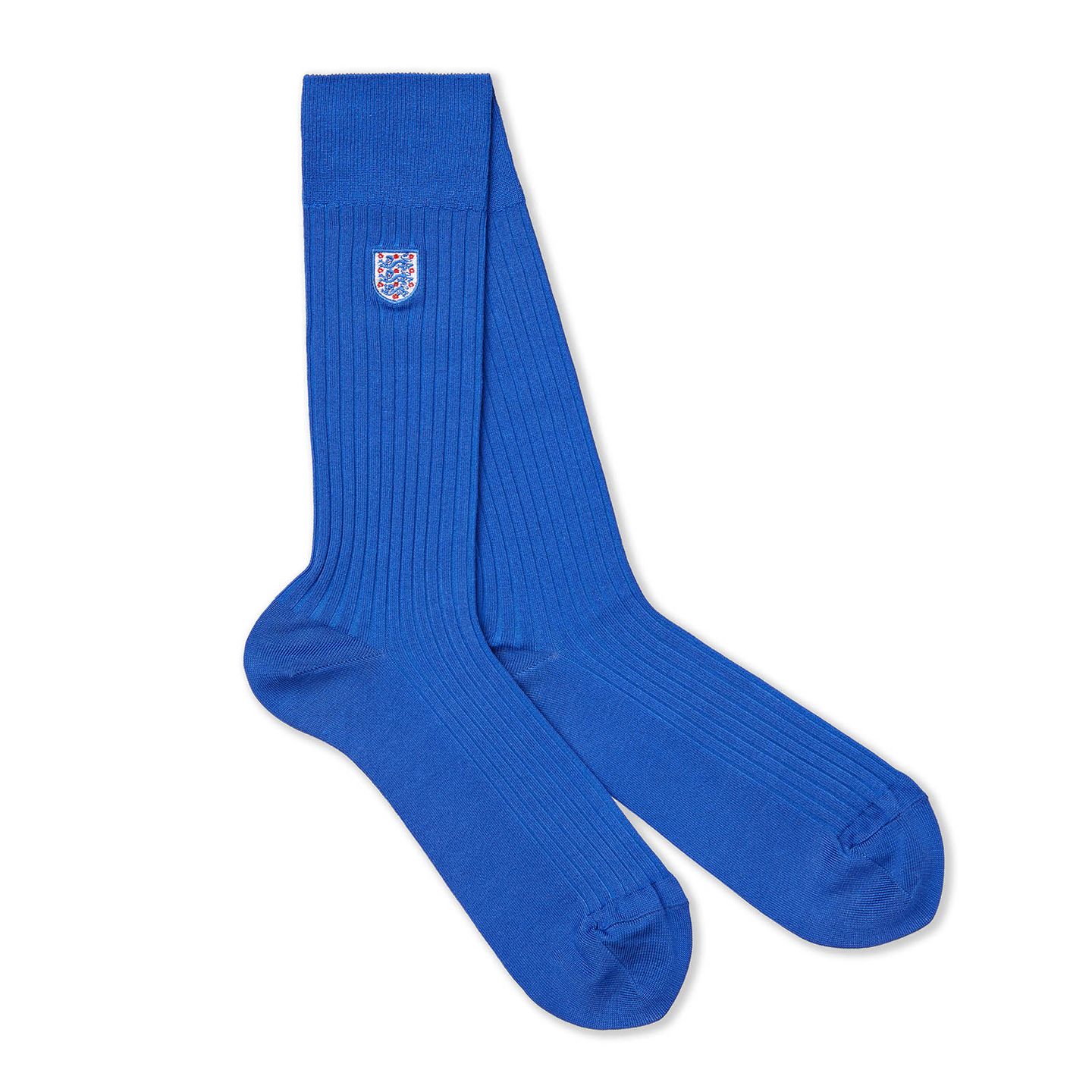 A pair of blue socks with the England badge on there