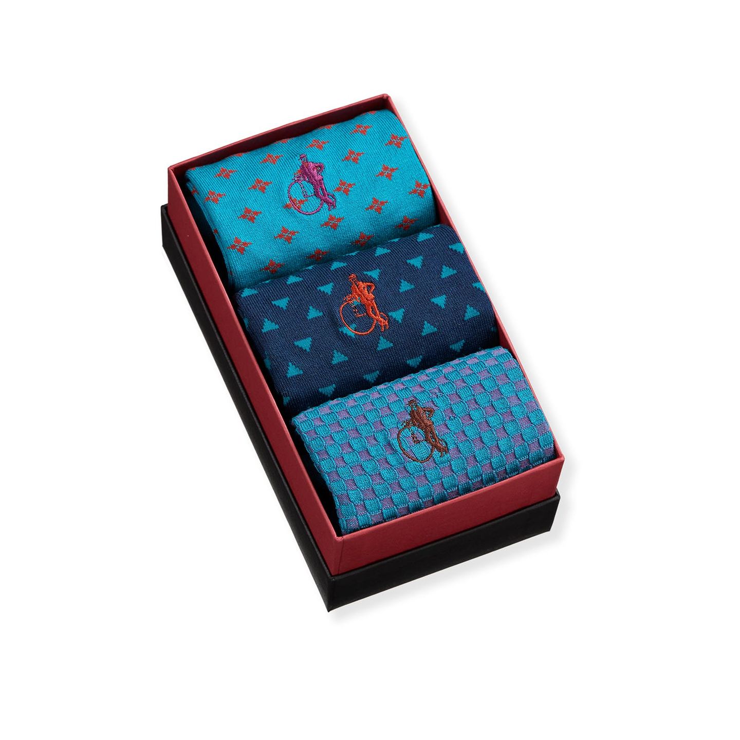 3 pair of blue patterned socks in a box