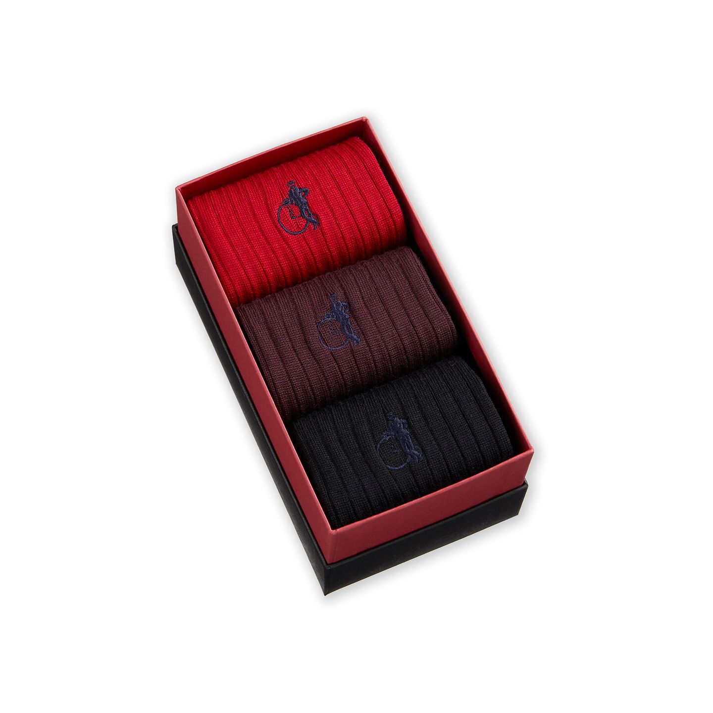 Trio of red, brown and black socks in a box