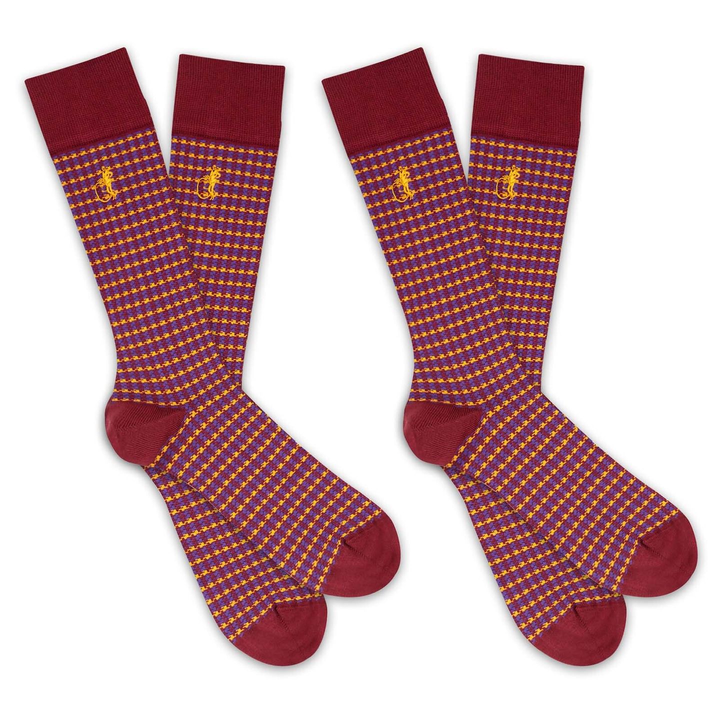 2 pair of red and yellow patterned socks with a white background