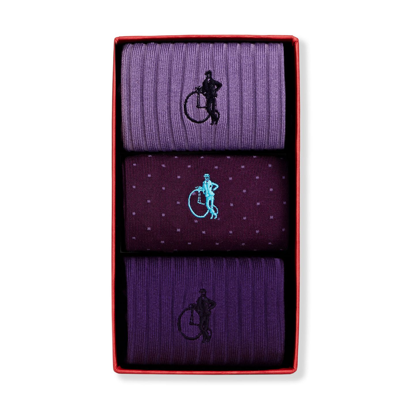 3 pair box of purple socks with one polka dot pattern