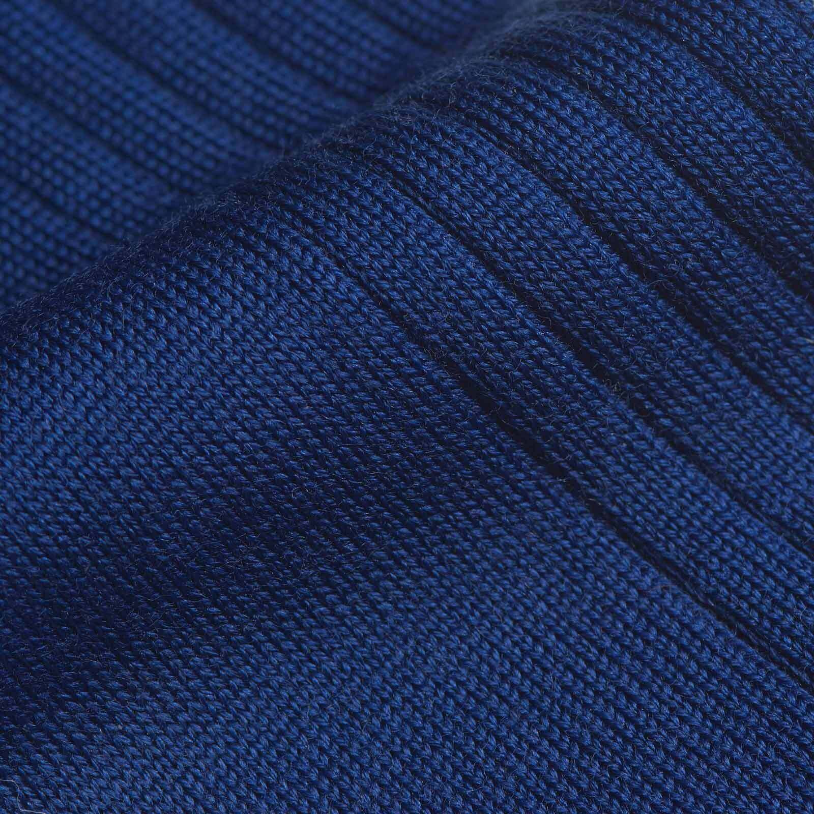 Close up of a blue merino sock